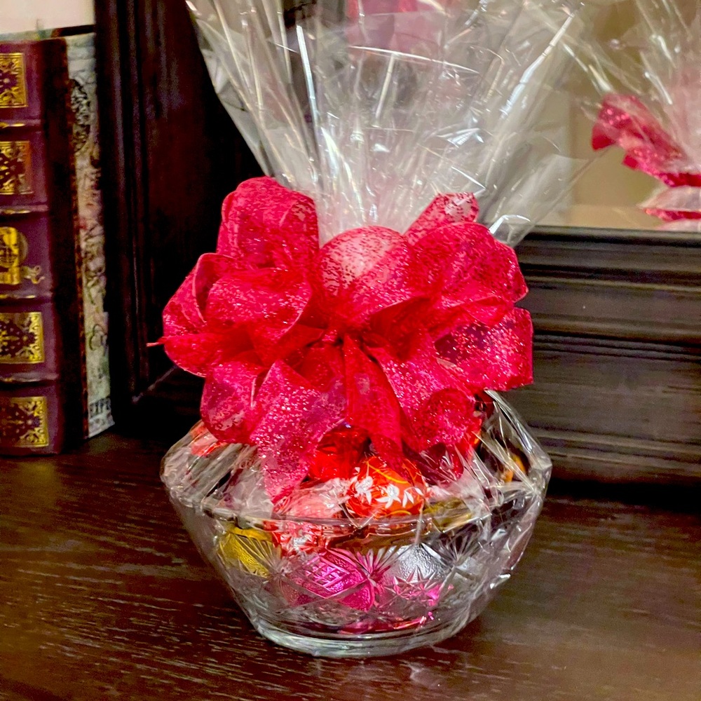 Beautiful glass candy bowls with Lindor, Dove, & Godiva chocolates.Decorated